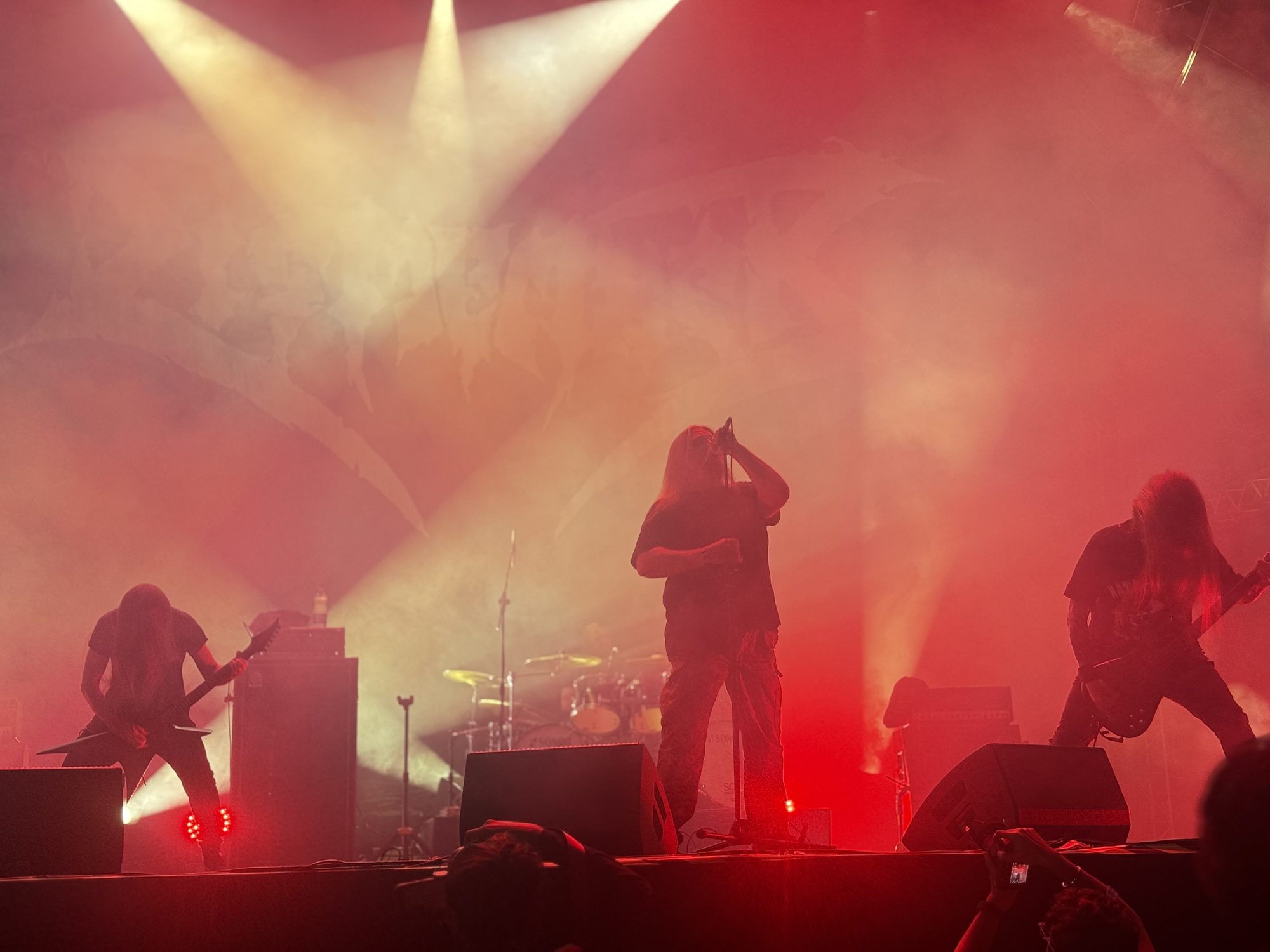 Dismember on a red-lit stage